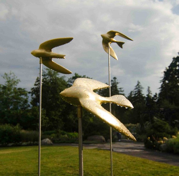 Swallows by John Bowdren Cedar, gold leaf, steel  photo by Frances Buerkens